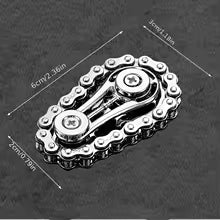 Sprocket Flywheel Chain Spinner. A mechanical chain spinner that feels incredible to fidget with. A pocket-sized machine for endlessly satisfying spins.