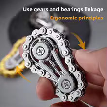 Sprocket Flywheel Chain Spinner. A mechanical chain spinner that feels incredible to fidget with. A pocket-sized machine for endlessly satisfying spins.